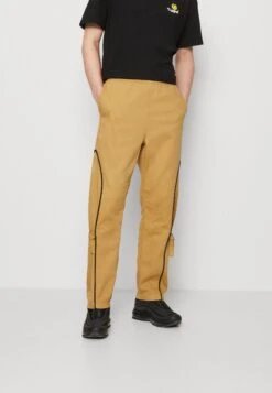 NIGHT ADDICT Naanon - Pantalones - Stone